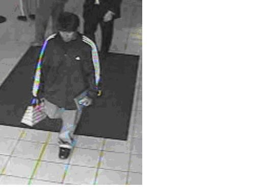 suspect photo from Chase Bank Robbery October 2 2010