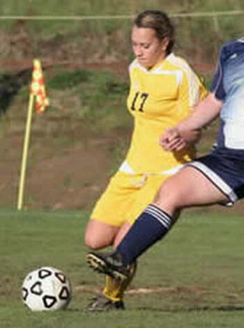Corban soccer player