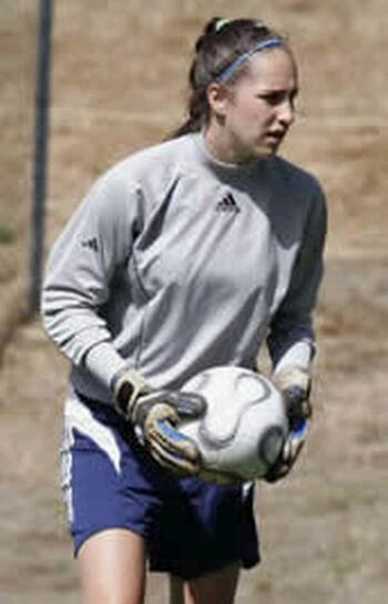 Corban soccer player