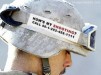 Soldier in Iraq with questionable sticker on his helmet