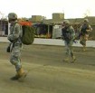 U.S. soldiers crossing a Kabul, Afghanistan road. by: Tim King