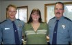 The woman who the troopers recovered is photographed with her rescuers; Trooper Lea, Debra Pease, and Senior Trooper Salisbury.