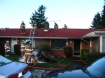 Portland Fire Fighters from Engine's 2 and 28 continue to remove smoldering material from an apartment fire in the 8100 block of NE Failing street Sunday Afternoon.