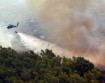 Navy helicopter fighting fires in California