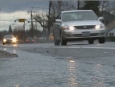 Car driving in flood