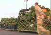 An airman on the flightline at Mannas Air Base in Kyrgystan securing gear that will be loaded aboard an Air Force jet bound for Afghanistan.  Soldiers at Mannas support the war effort but live more safely, outside the combat theatre