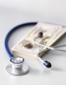 stethoscope and money