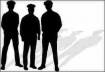 Police officers in shadows