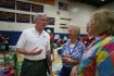 Red Cross President and CEO Mark Everson talks with evacuees Helene Johnson (left) and Pam Jones (right). 