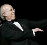 Karl Rove doing his act on a stage