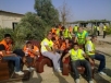 Moments before the destruction of the Bedouin village of al-Arakib, Israeli high school age police volunteers lounge on furniture 
