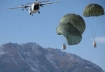 Blackwater CASA 212 over Afghanistan dropping supplies to U.S. Army troops