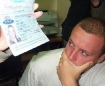 Rachel Corrie s friend looking at her passport, shortly after hour violent death