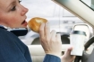 eating donut in car
