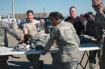 First responders use a table as a stretcher to transport a wounded Soldier to an awaiting ambulance at Fort Hood Nov. 5.