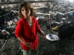 Girl from Gaza in her former classroom at a United Nations school bombed by Israel
