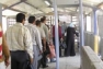 Palestinians wait in a queue at Beit Iba checkpoint in Gaza.