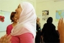 Iraqi refugees participating in a workshop in Damascus