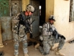 Two soldiers from the U.S. Army`s 101st Airborne during a light hearted moment, while on patrol in Iraq