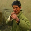 Afghan kid making fists