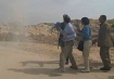 Israeli soldier shoving Dr. Mazin Qumsiyeh