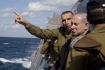 A method in mighty military madness: Hardliner Benjamin Netanyahu photographed touring a German submarine.