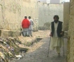 Man in an alley in Kabul, Afghanistan