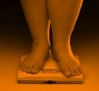 Overweight person on scale