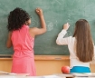 Kids at chalkboard