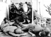 Infamous photo of soldiers kneeling at the U.S. Consulate building during the Tet Offensive. 