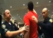 Irvine police remove an anti-genocide protester from a speech at UC Irvine