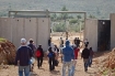 Above: Protestors approach the Wall in Ni`lin.