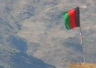 Flag over an Afghan military base at Jalalabad