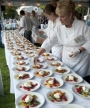 Chefs prepare dishes for the festivities at McMinnville's Pinot Noir Celebration.