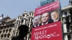 A huge billboard ad displayed the King of Spain, Bill Clinton, and King Charles of England