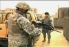 Americans in Kabul, Afghanistan preparing to head 'outside the wire' ready their weapons