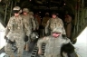 Haven't they fought enough by now?  U.S. forces exit a cargo plane in Afghanistan.  Salem-News.com photo by Tim King.