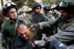 One of many images from `Land Day` showing Israeli troops abusing and arresting peaceful demonstrators.