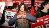 Thousands of Israelis march for human rights in Tel Aviv, 10 December 2011.