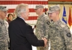 Oregon Governor John Kitzhaber congratulates Oregon Army National Guard Spc. Steven Armstrong