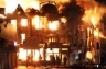 A building in London set on fire after it was ransacked by the looters.