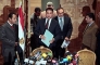 Egyptian investigative judges investigating the foreign funding of NGOs, enter a press conference at the Justice Ministry in Cairo on Feb. 8, 2012