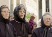 Nuns receiving awards for peace, Ardeth Platte, Carol Gilbert, and Jackie Hudson on the right. 