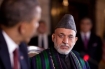 Afghan President Hamid Karzai listens as President Barack Obama delivers remarks during the strategic partnership agreement signing ceremony at the Presidential Palace in Kabul, Afghanistan, May 1, 2012. (Official White House Photo by Pete Souza)