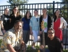 Back row left to right: Madison Hinton, Annamarie Carlson, Rachel Bogdan, Katie Powell, Kelly Moss, Brittany Fornoff. Kneeling in front Patrick Jaco Roberts and Cisco