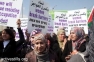 Palestinian women facing soldiers near Qalandia checkpoint (Oren Ziv / Activestills)