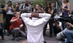 Protested falls to his knees in tears in front of Chase Bank crying - this is the bank that took my parents' home