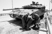 IDF soldiers struggle to repair a tank damaged by Hesbollah during the fighting in 2006. Photo by Dexter Phoenix