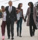 The picture of the Obama family, at top, is by Doug Mills of the New York Times.