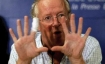 The journalist Robert Fisk speaking at a conference.